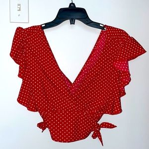 Red poka dot shirt, ties on the side, zipper on side, size small